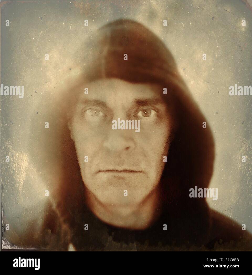 Man wearing a hood hi-res stock photography and images - Alamy