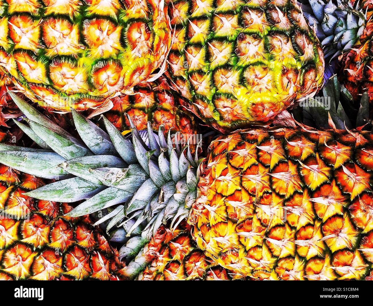 Luscious Pineapples at Market Stock Photo