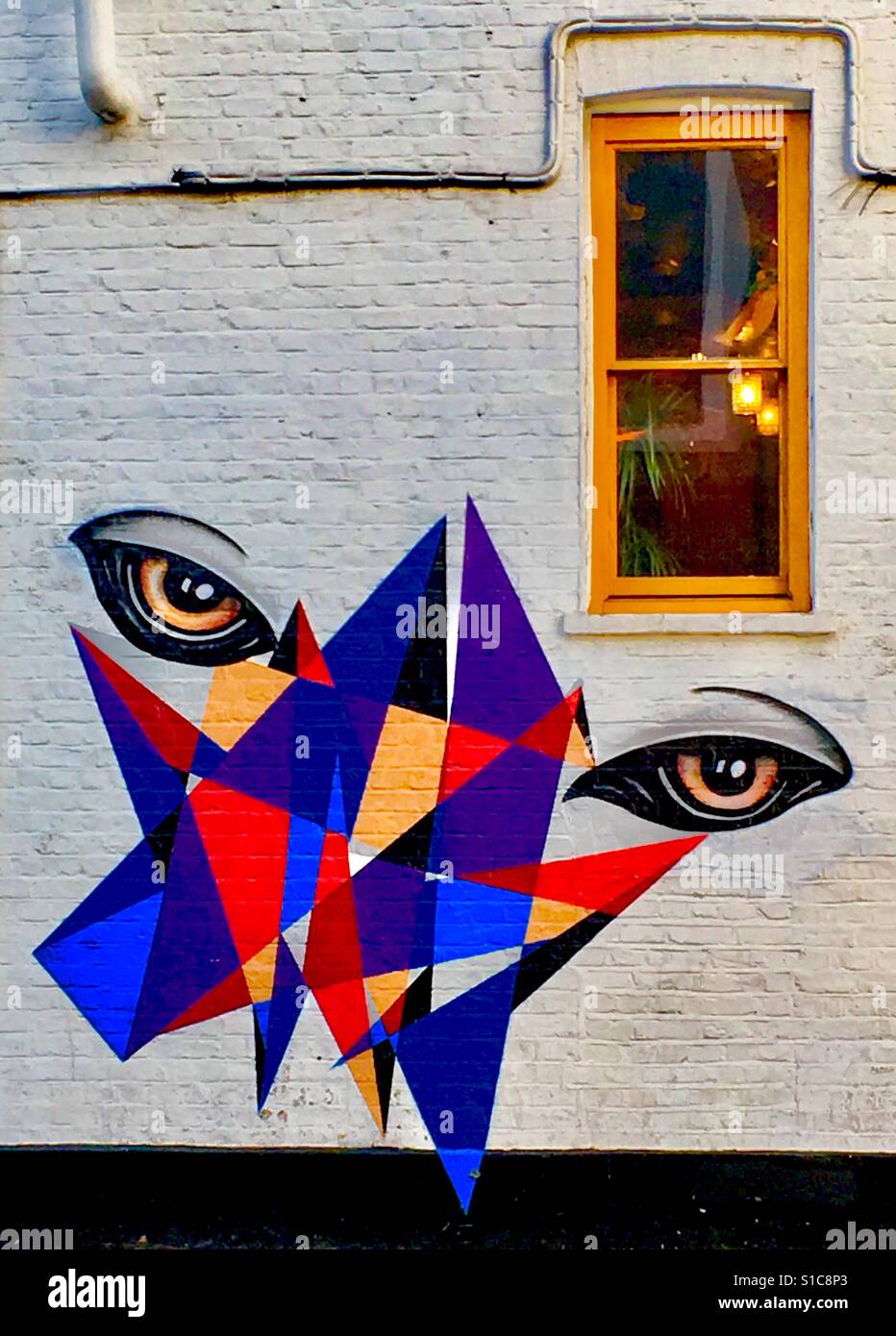 Eyes watching modern street art - Smartphone Captured Stock Image
