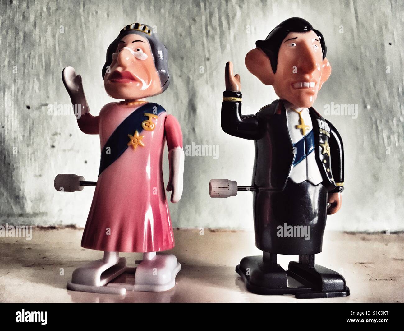 Clockwork Queen & Prince Charles toys Stock Photo Alamy