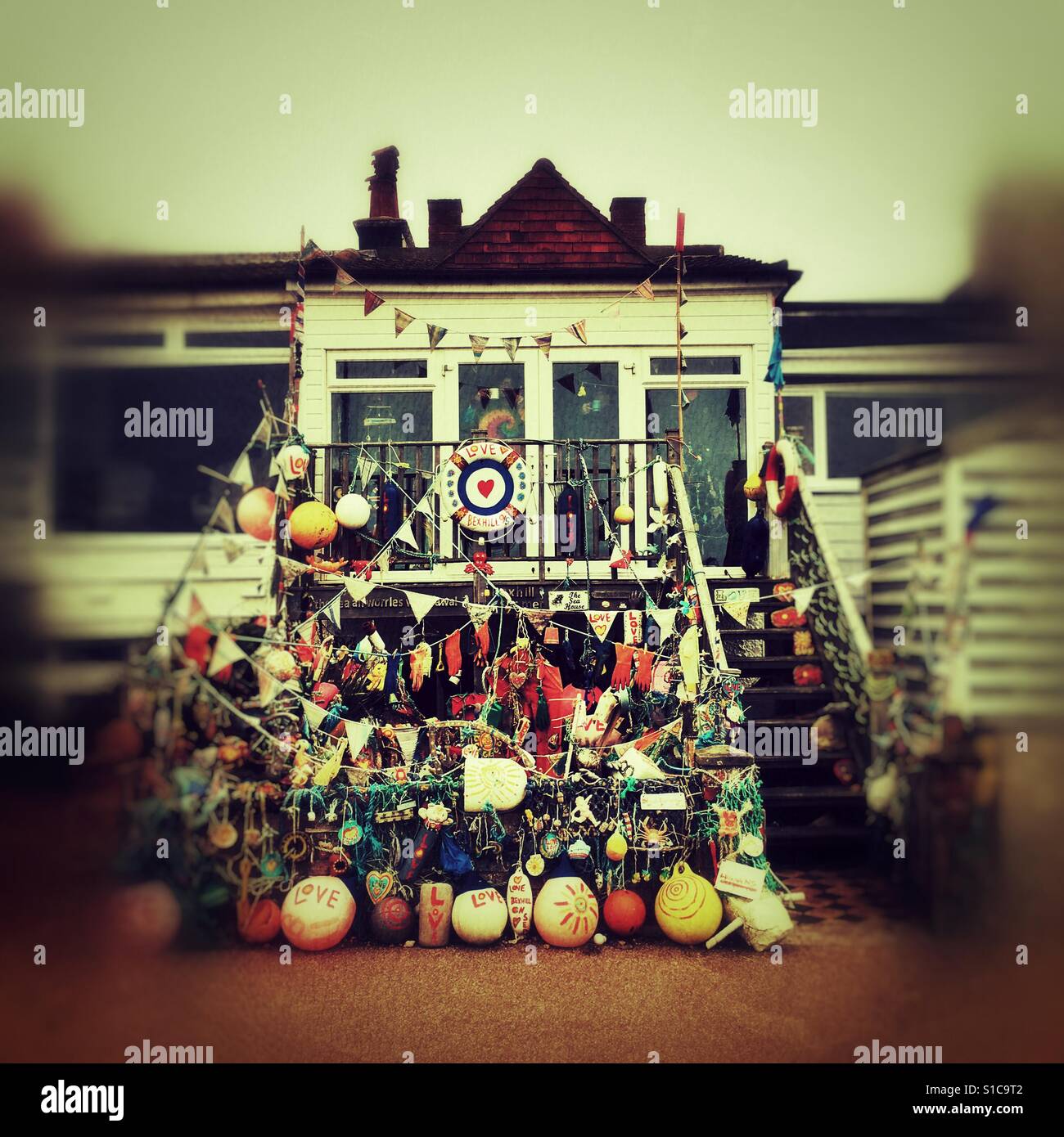 A house heavily decorated with marine objects at the seafront of Bexhill on Sea, East Sussex, England, UK - Smartphone Captured Stock Image