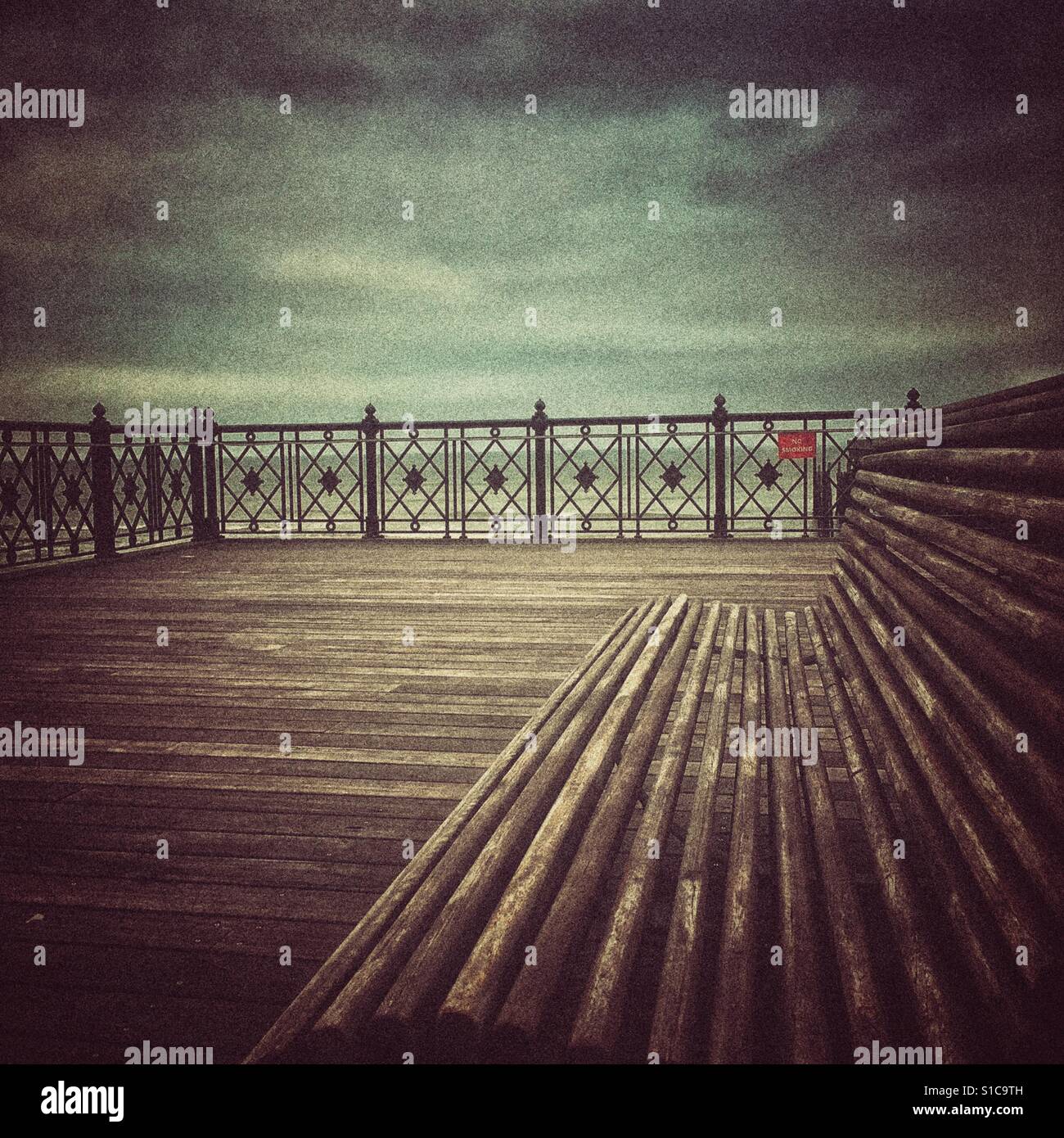 Hastings Pleasure Pier with elaborate ironwork handrails, East Sussex, England, UK - Smartphone Captured Stock Image