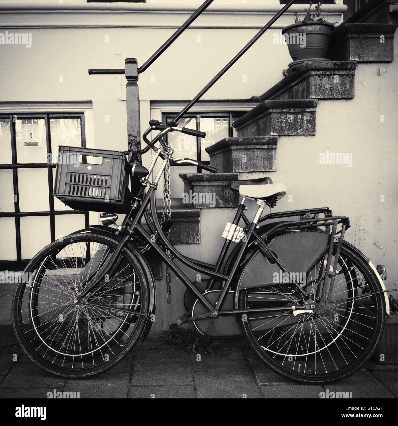 Two bicycles parked in the street in Amsterdam, the Netherlands - Smartphone Captured Stock Image
