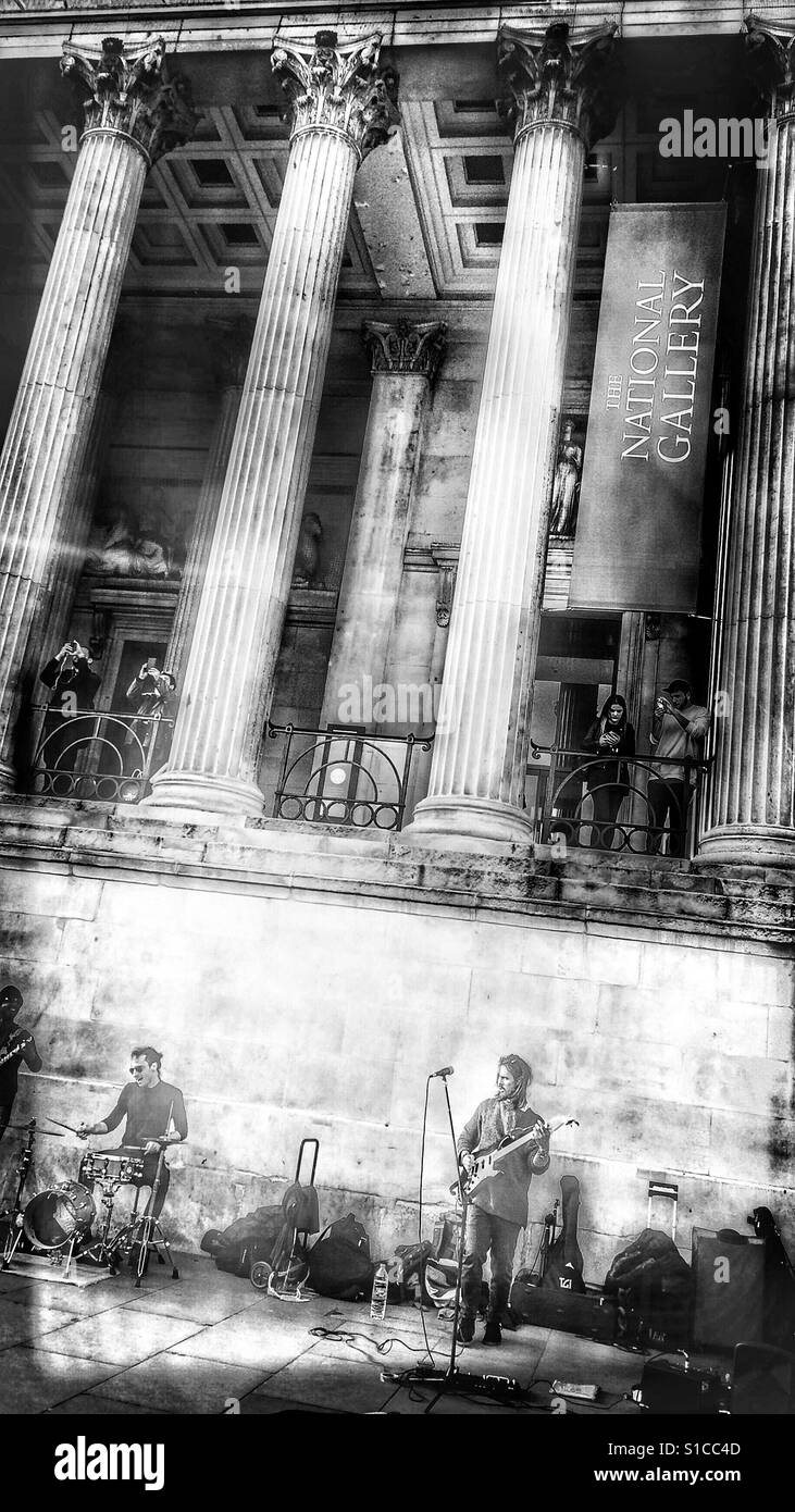 Buskers playing in front of the National Gallery, Trafalgar Square, London - Smartphone Captured Stock Image