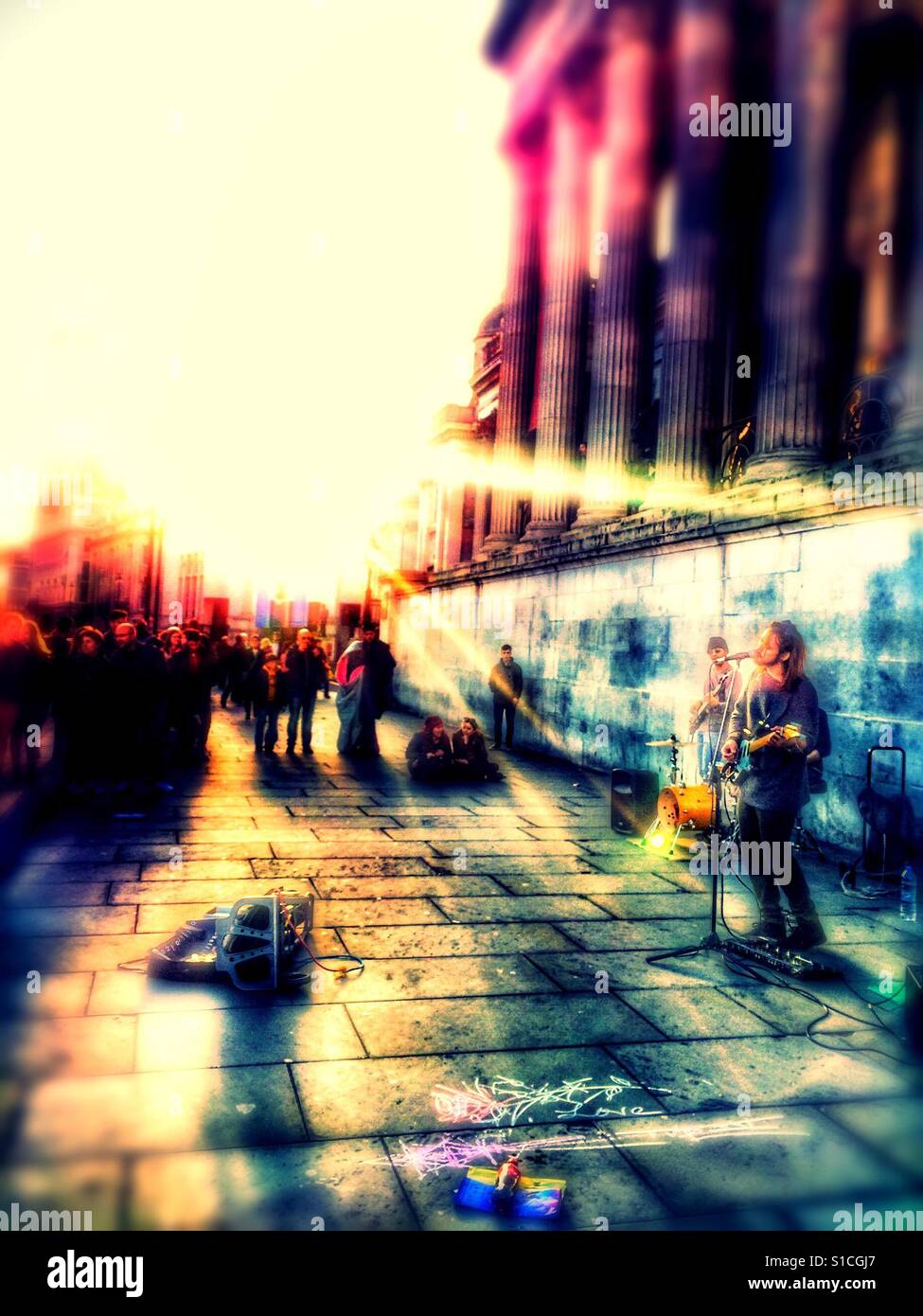 Watching in sun rays, Trafalgar Square, London Stock Photo
