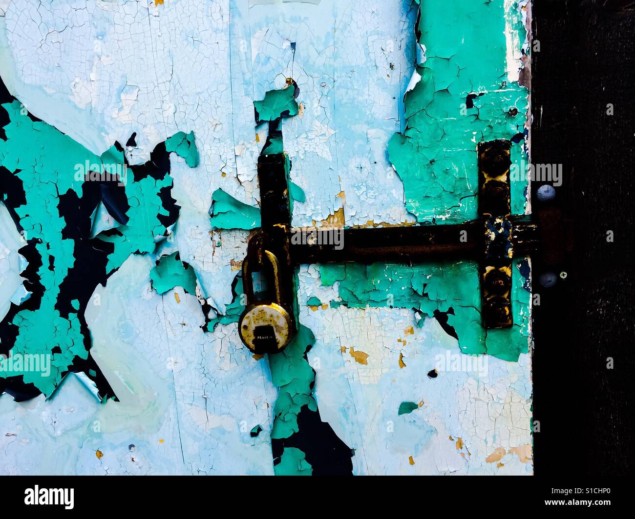 Old door, lock, peeling paint Stock Photo Alamy