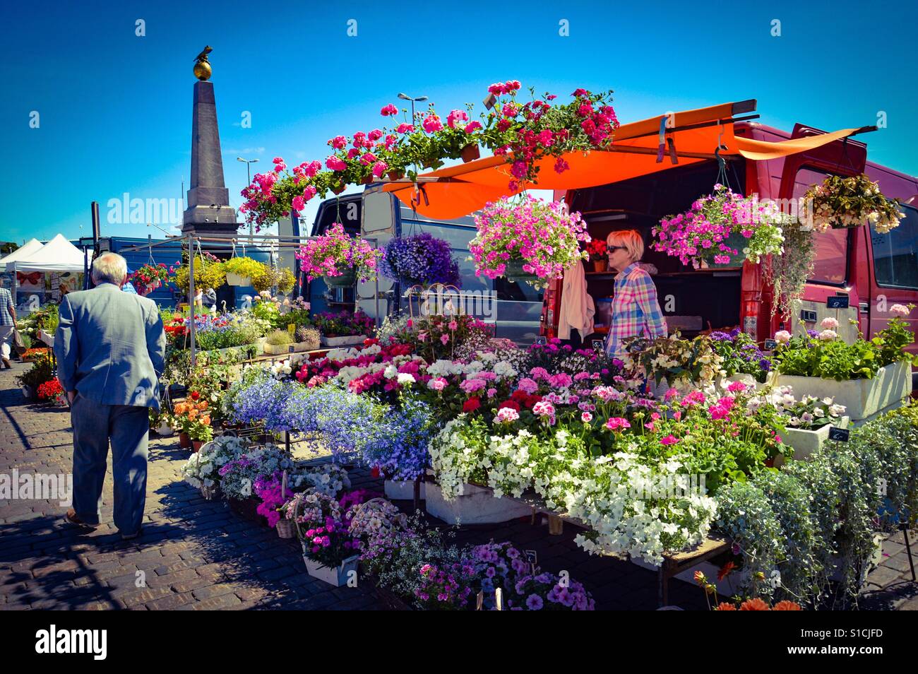 Flower and plant shop at Market Square (Kauppatori) in Old Town harbourfront pier of Helsinki, Finland Stock Photo