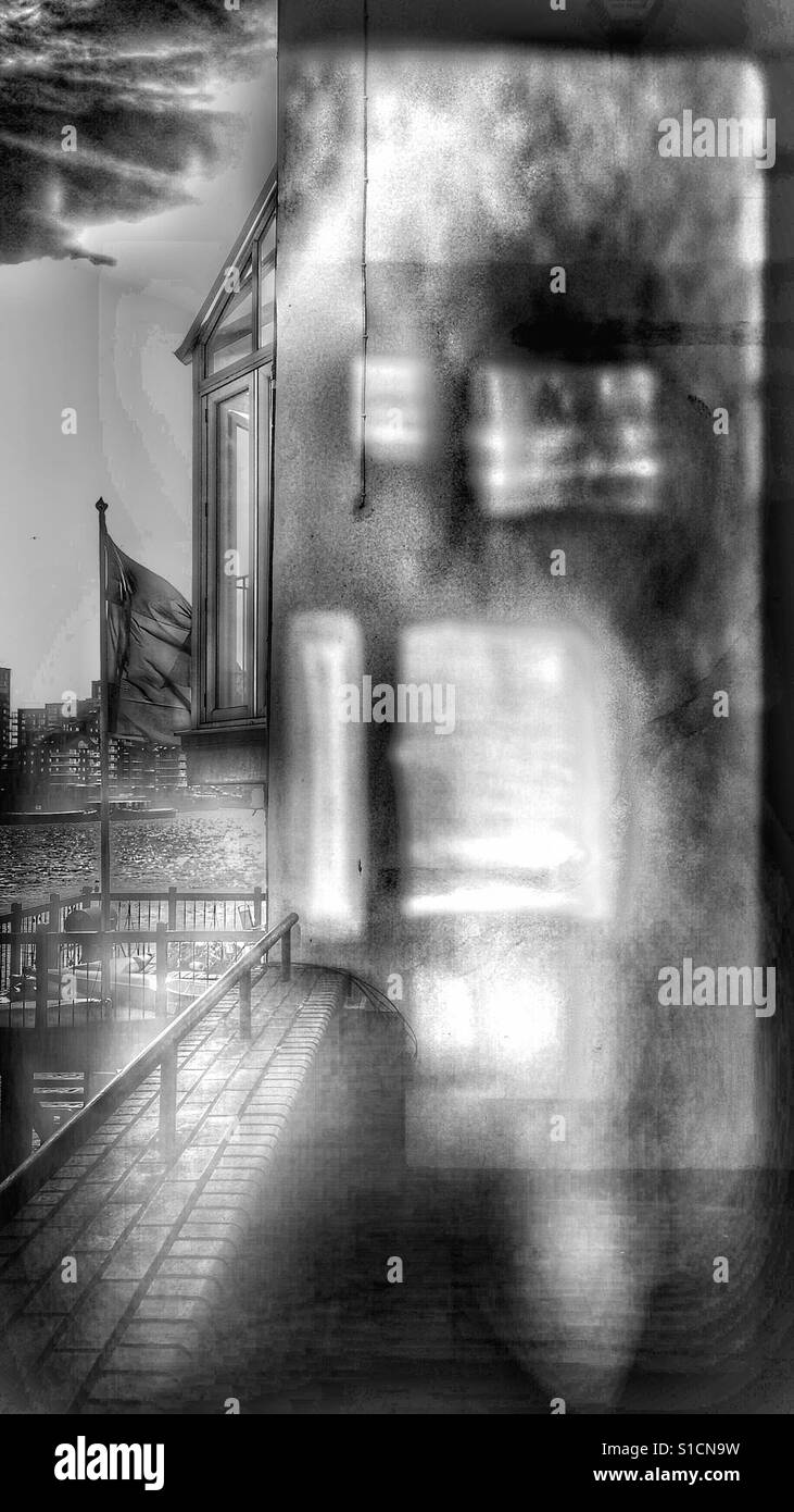 Sunlight shapes on riverside wall, London - Smartphone Captured Stock Image