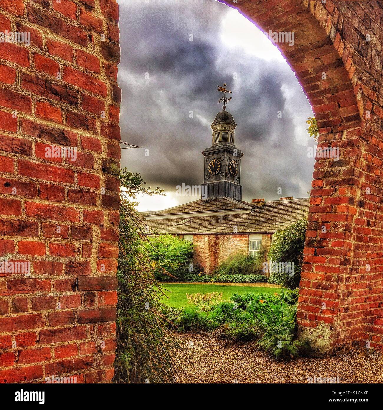 Clock Tower and Arch at Belmont house and gardens in Kent. Stock Photo