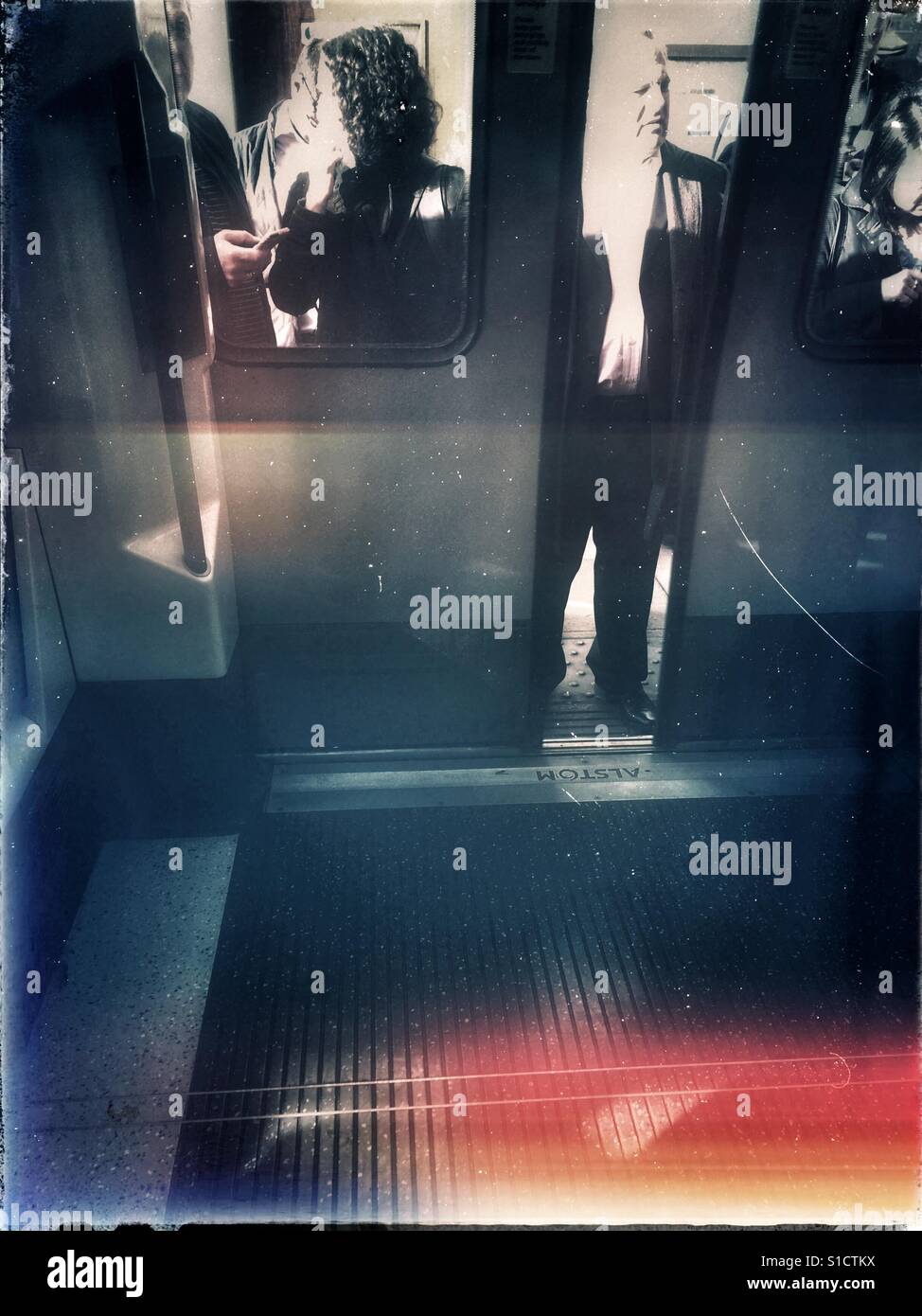 Getting ready to board the Tube train - Smartphone Captured Stock Image