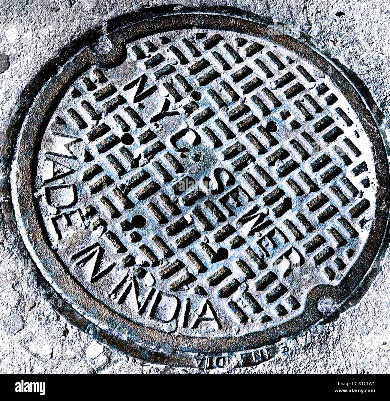 N.Y.C. (New York City) Sewer Man Hole Cover, Made in India (written twice) Stock Photo