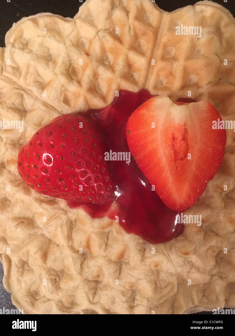 Waffles jam and strawberries for breakfast - Smartphone Captured Stock Image