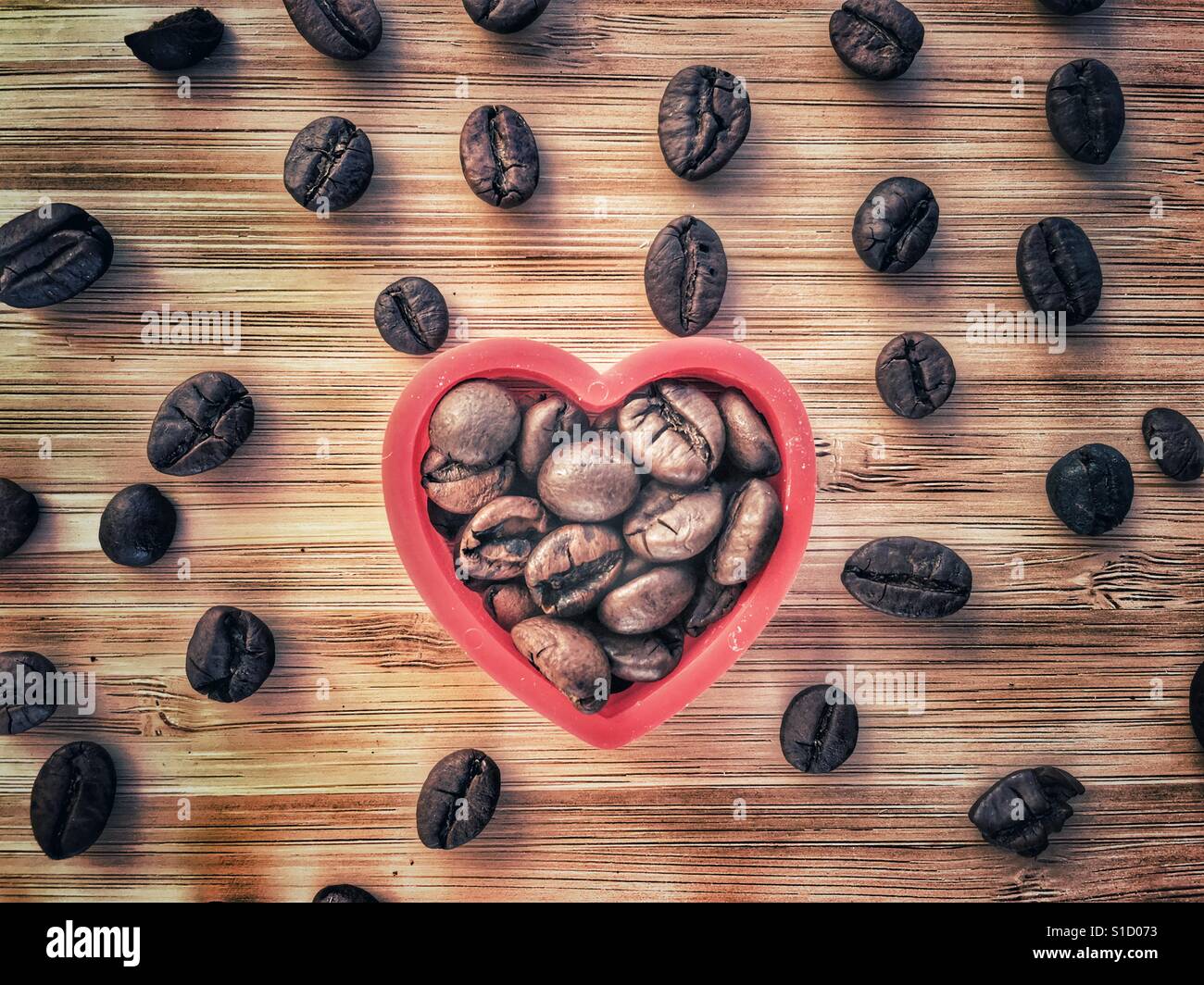 Coffee beans in red heart - Smartphone Captured Stock Image