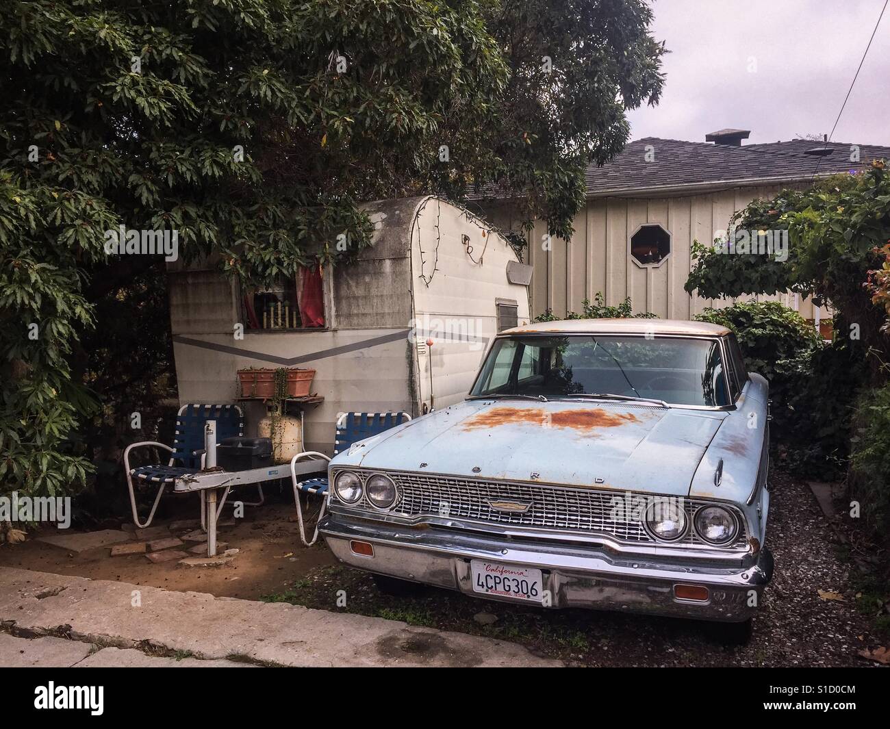 Vintage ford and trailer in front of home, Santa Barbara, CA - Smartphone Captured Stock Image