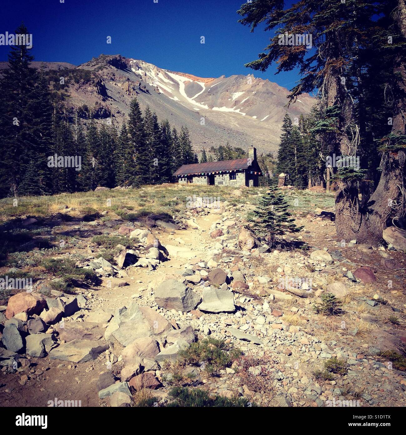 Horse Camp  is a stone lodge partway up Mt. Shasta and serves as a stop over or base camp for hikers on their way to the summit. - Smartphone Captured Stock Image
