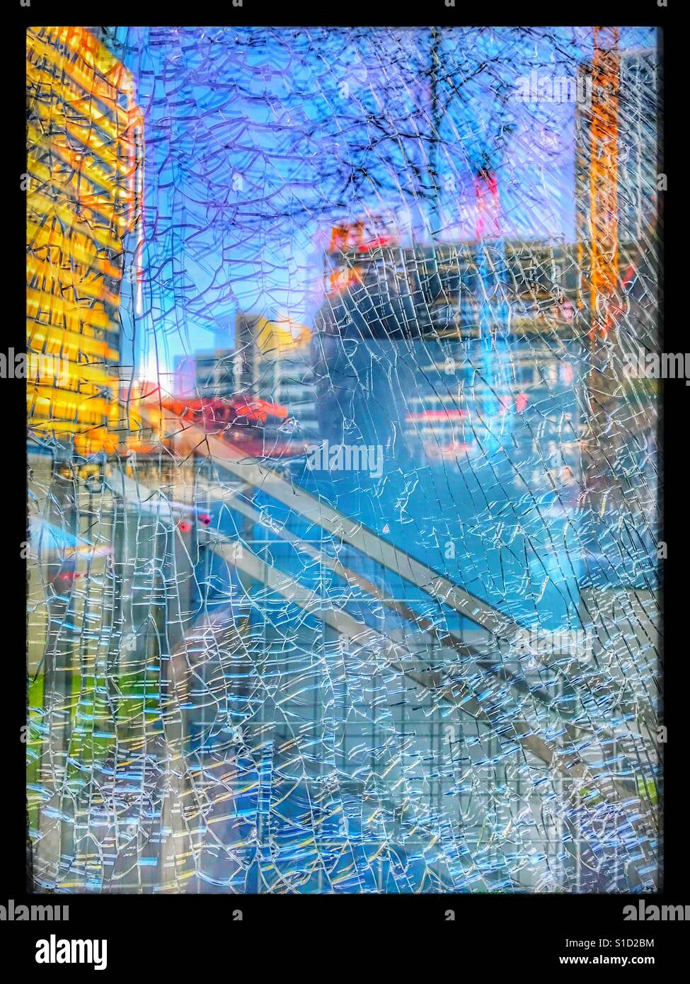 Cracked reflection of Seattle construction Stock Photo