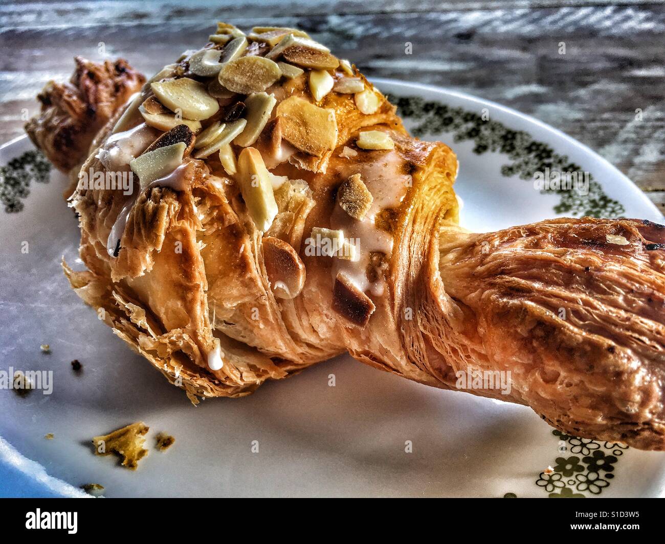 Almond croissant on a plate - Smartphone Captured Stock Image
