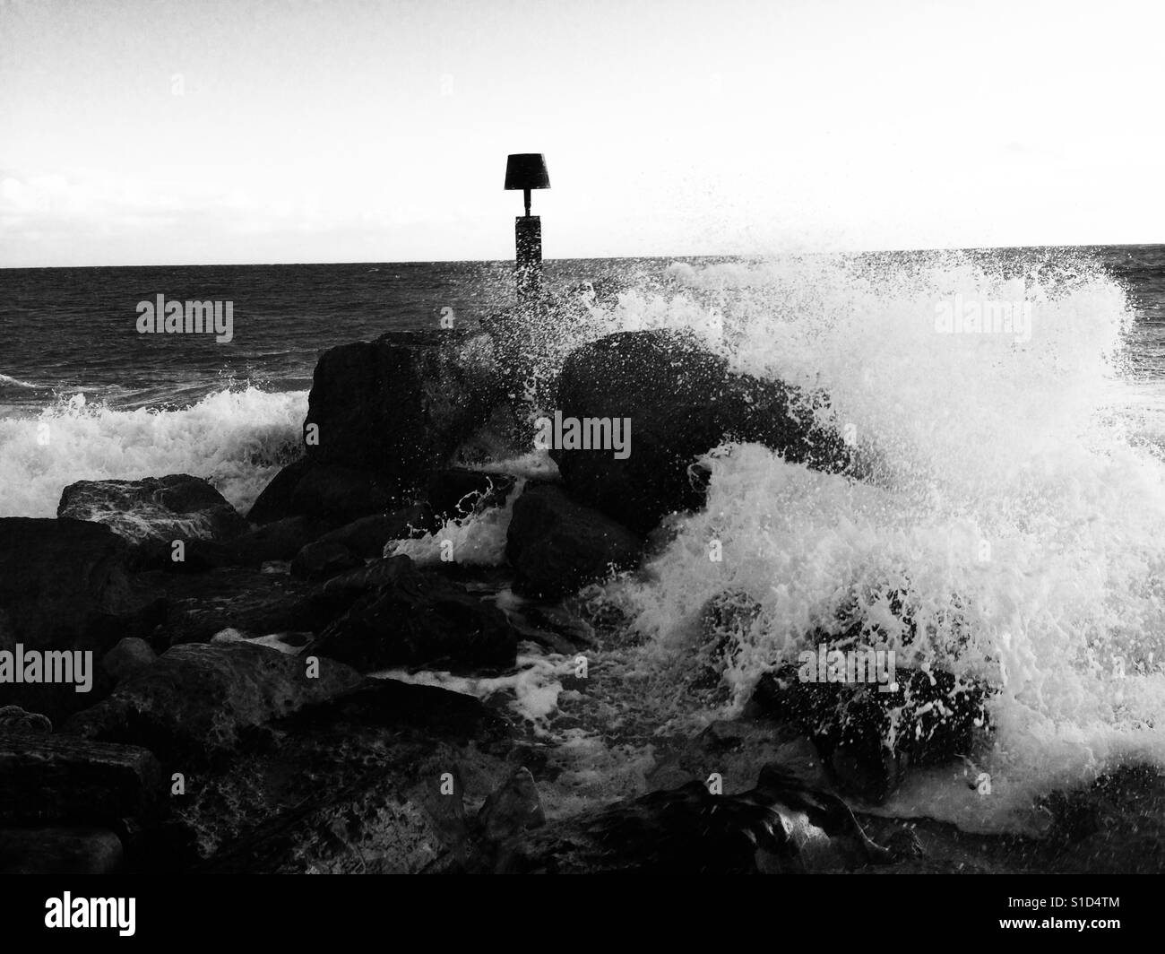Rough sea breaking on rocks - Smartphone Captured Stock Image