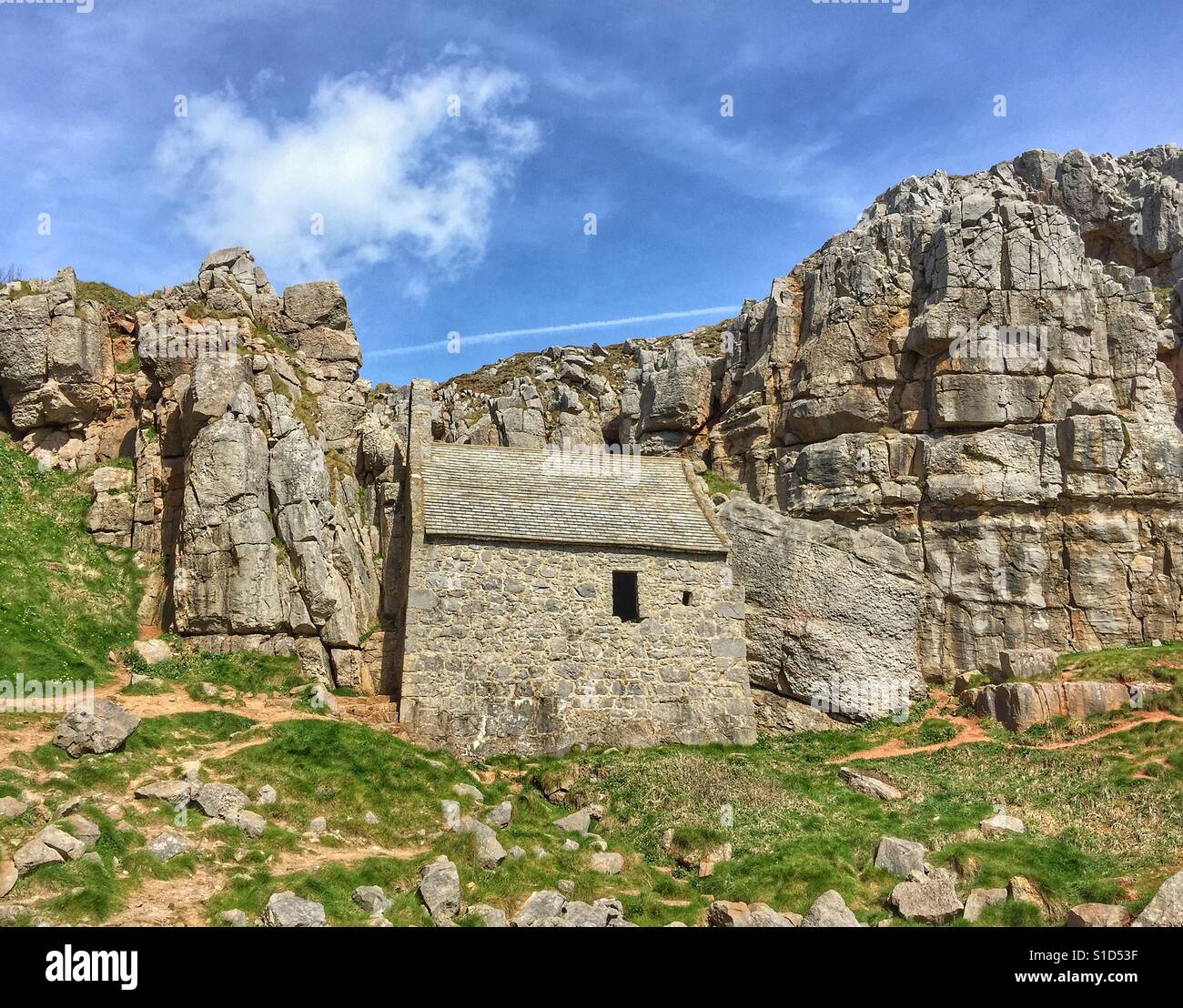 St Govan's Chapel hidden in the cliffs Stock Photo - Alamy