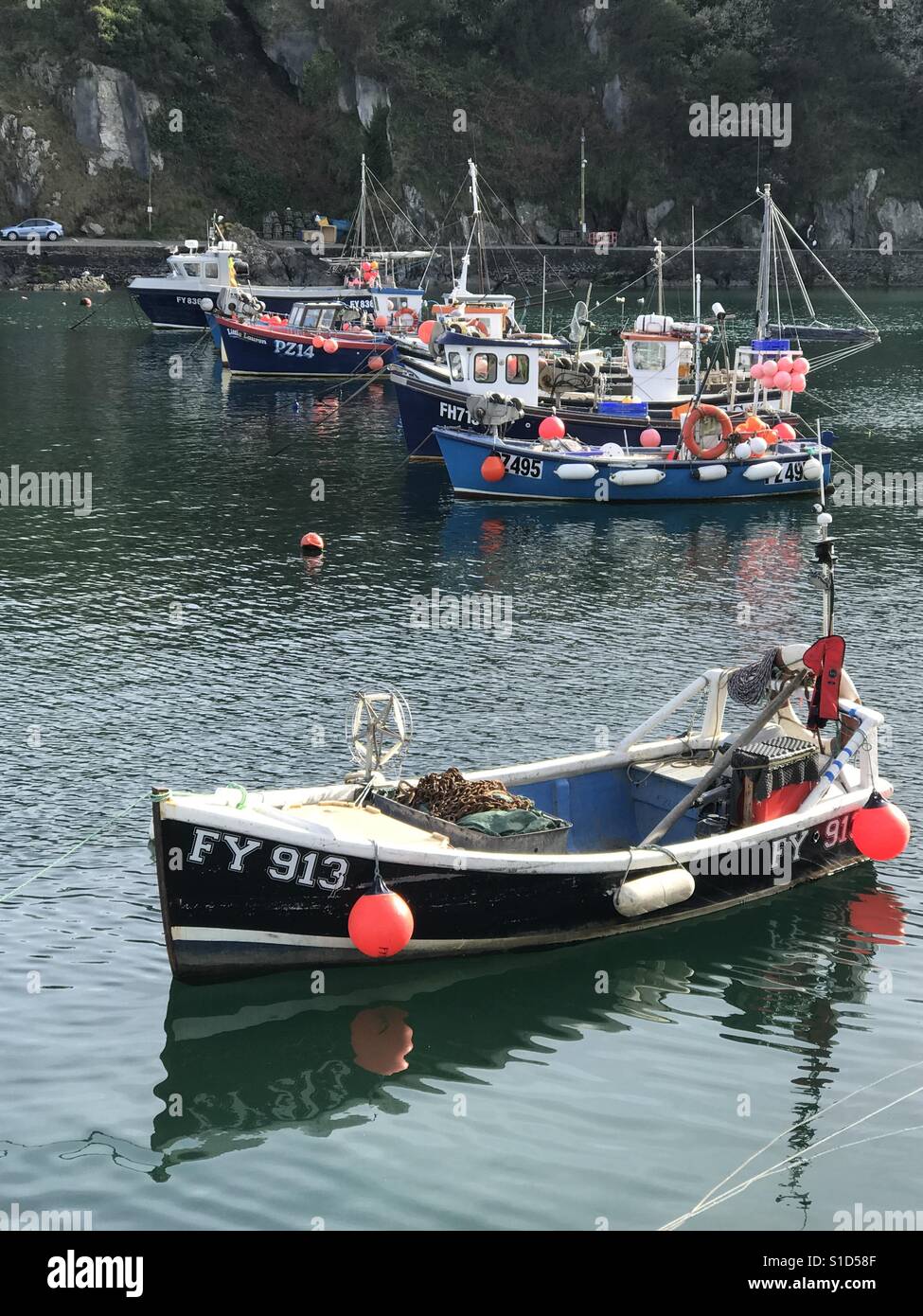 Fishing boats lined up in harbour - Smartphone Captured Stock Image