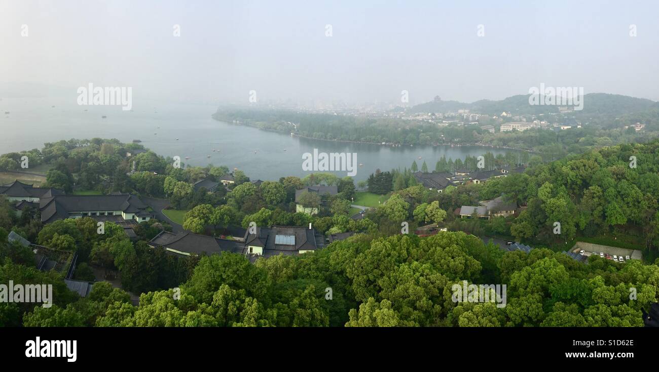 Finally took a trip to climb to the top of the Leifeng Pagoda in Hangzhou, China. Its really beautiful and I was blessed with good weather. I was a little disappointed that the inside was so modern Stock Photo