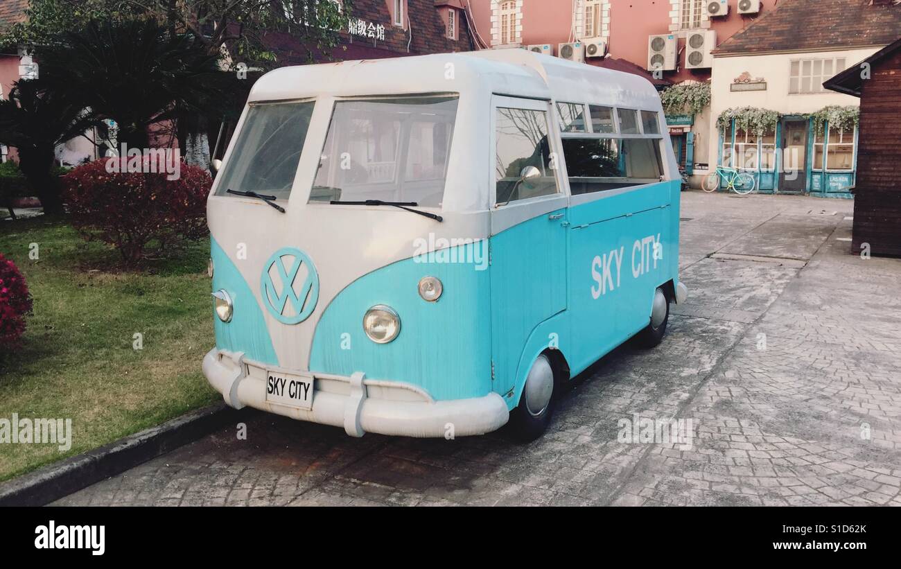 Took a day trip to little Paris in Hangzhou, China and saw this blue Volks Wagen bus Stock Photo