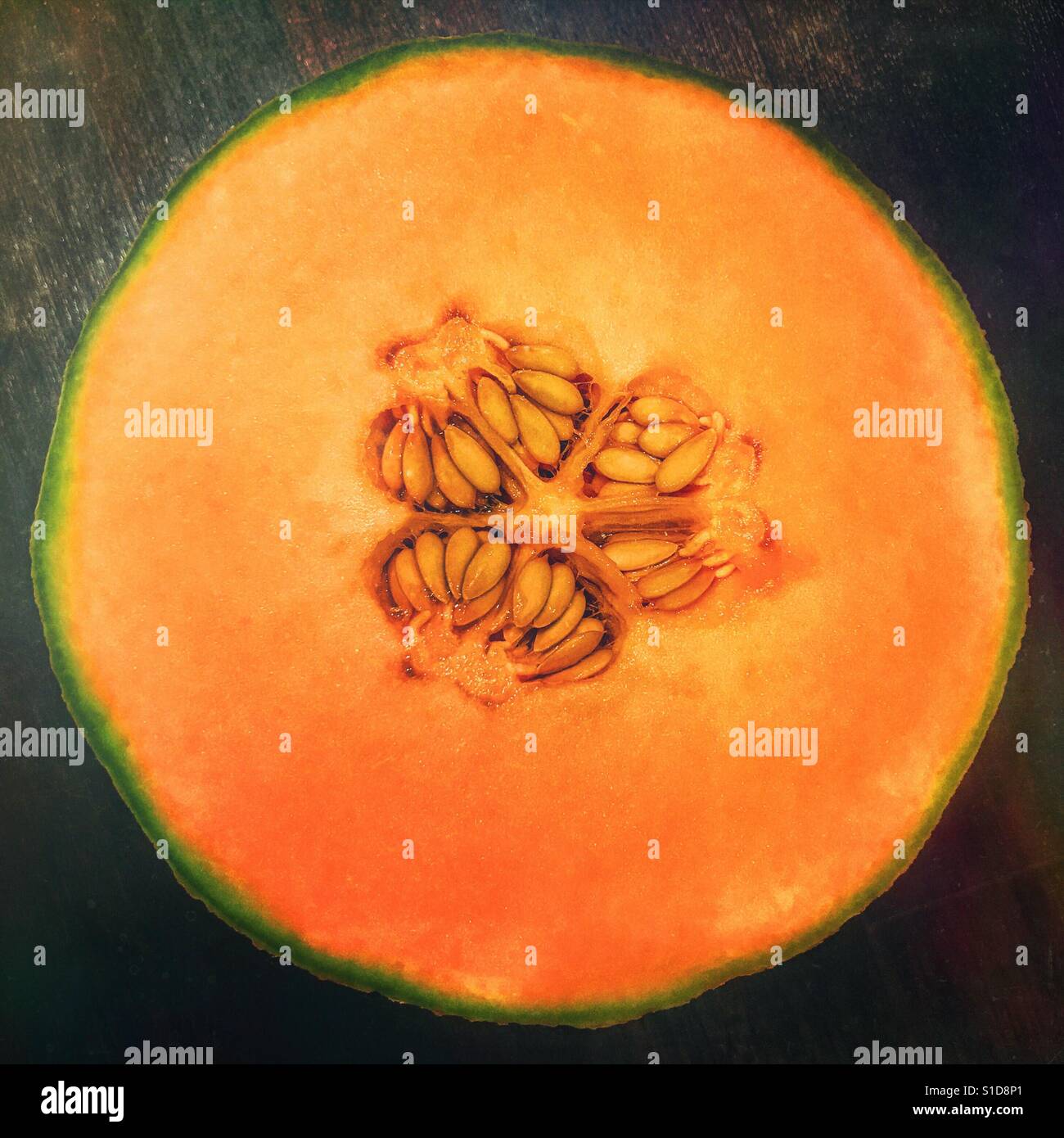 Cross section of a cantaloupe melon - Smartphone Captured Stock Image