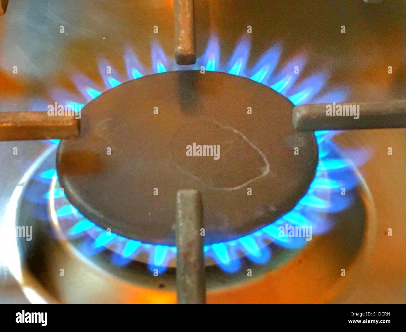 Gas burner ring on a cooker Stock Photo Alamy