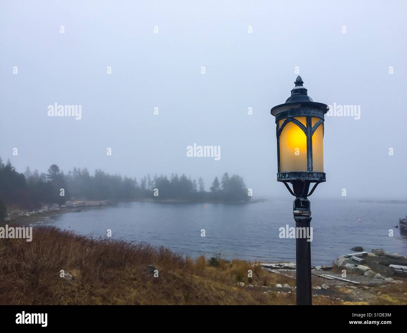 Fog in a fishing cove - Smartphone Captured Stock Image