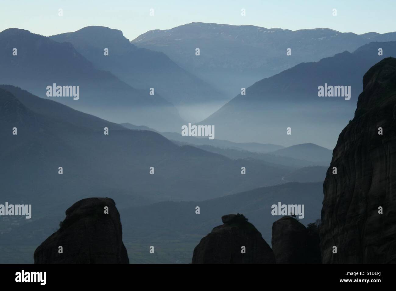 Night falling on the Meteoras mountains, Greece - Smartphone Captured Stock Image