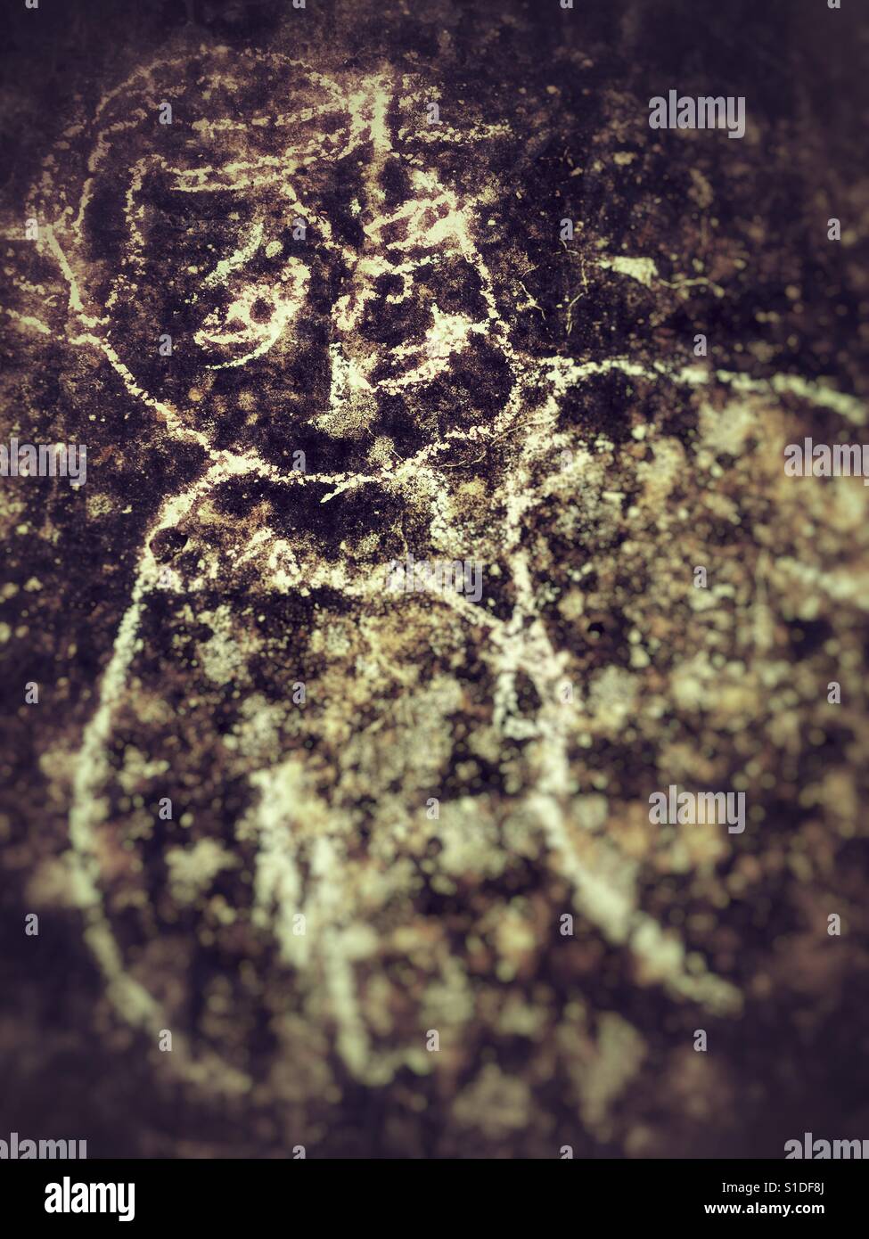 Chalk drawing of man drawn on a pavement - Smartphone Captured Stock Image