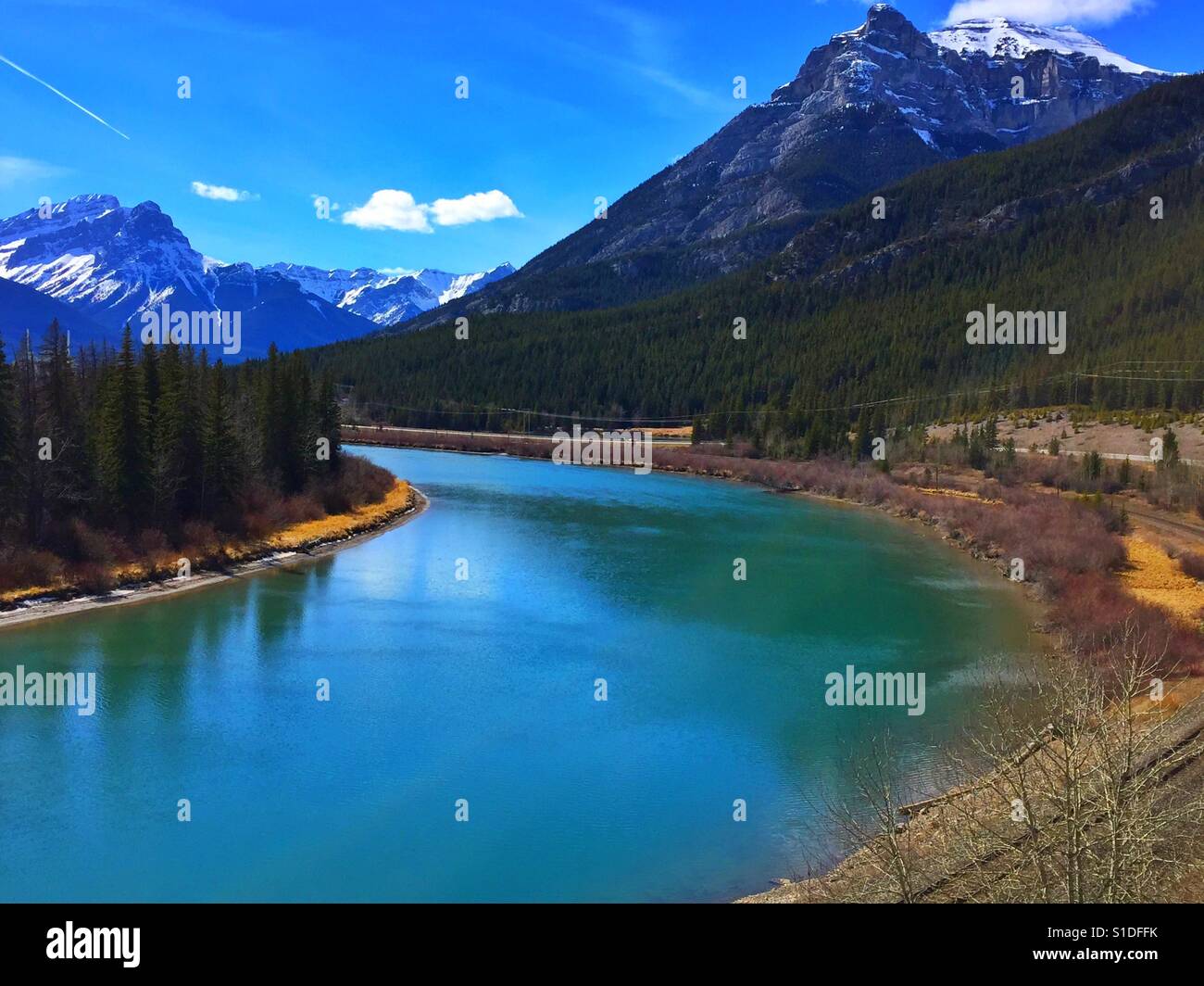 Bow River, Canadian Rockies, Blue Ski Stock Photo