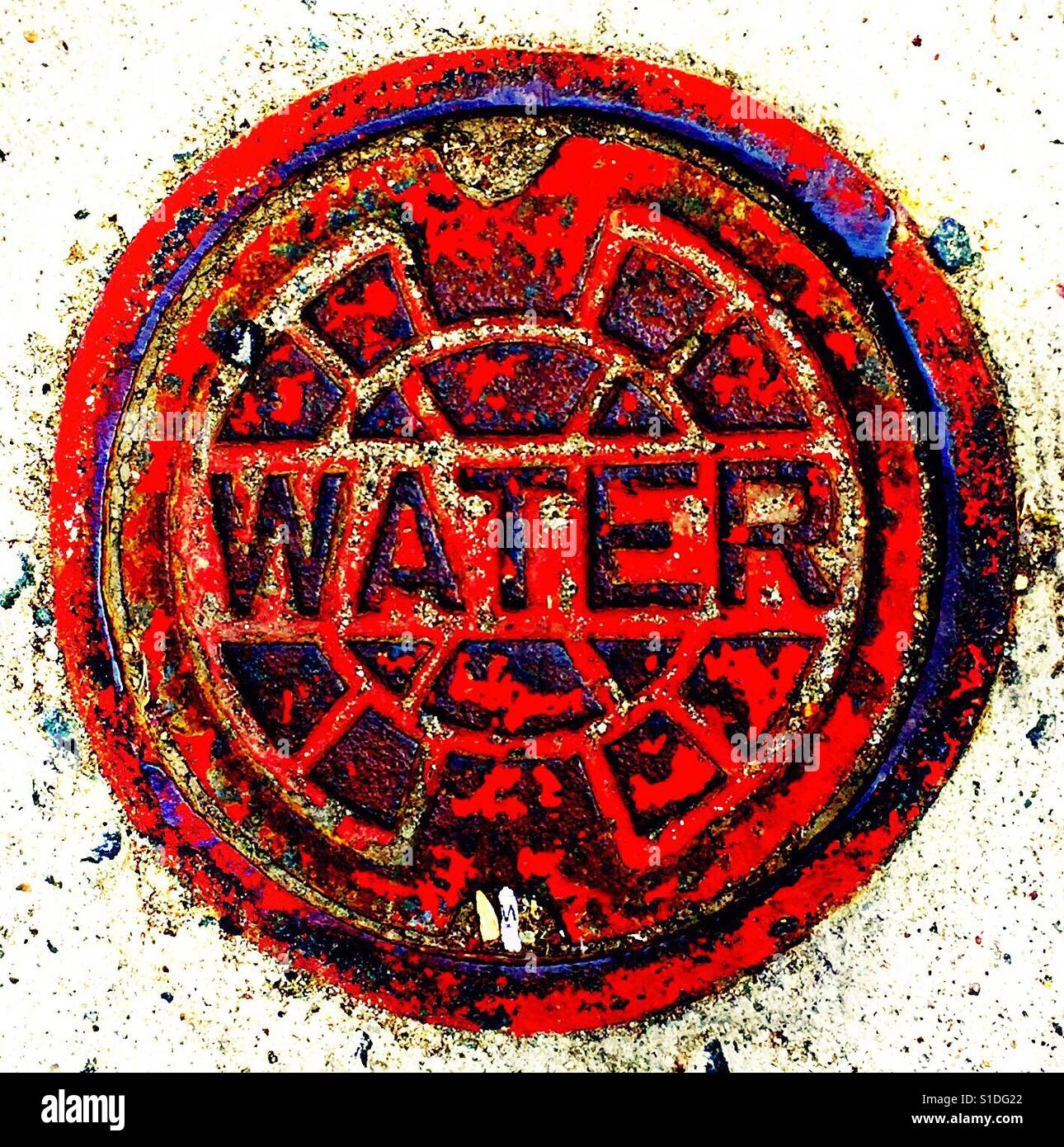 Water manhole embossed with the word water in large letters hires stock photography and images