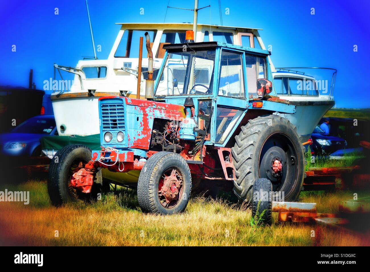 Old blue tractor Stock Photo Alamy