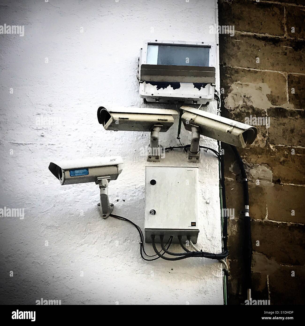 Surveillance cameras in a street in Baeza, Jaen province, Andalusia, Spain - Smartphone Captured Stock Image
