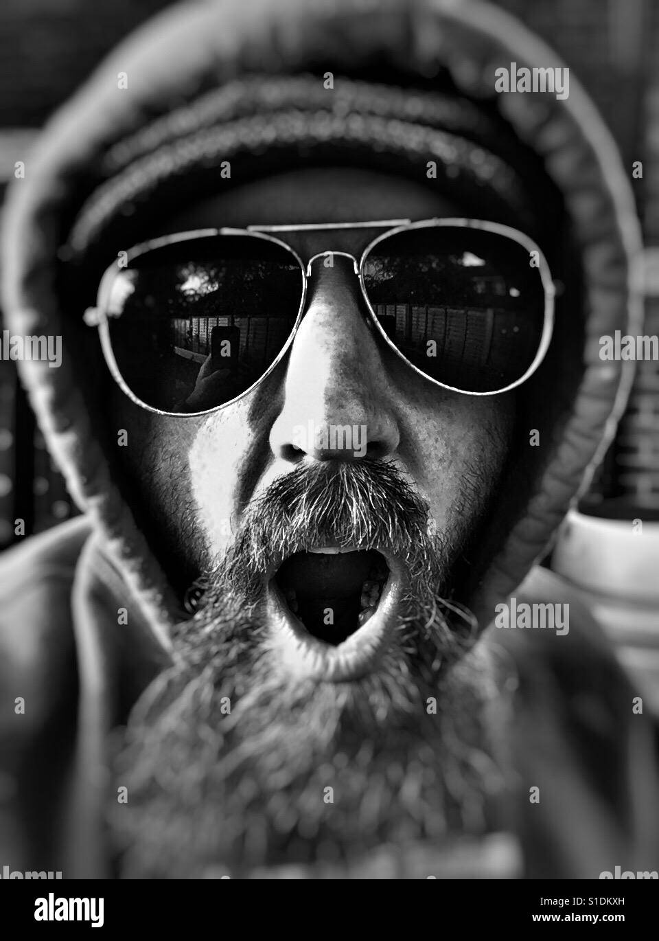 Man with beard wearing Sunglasses Stock Photo