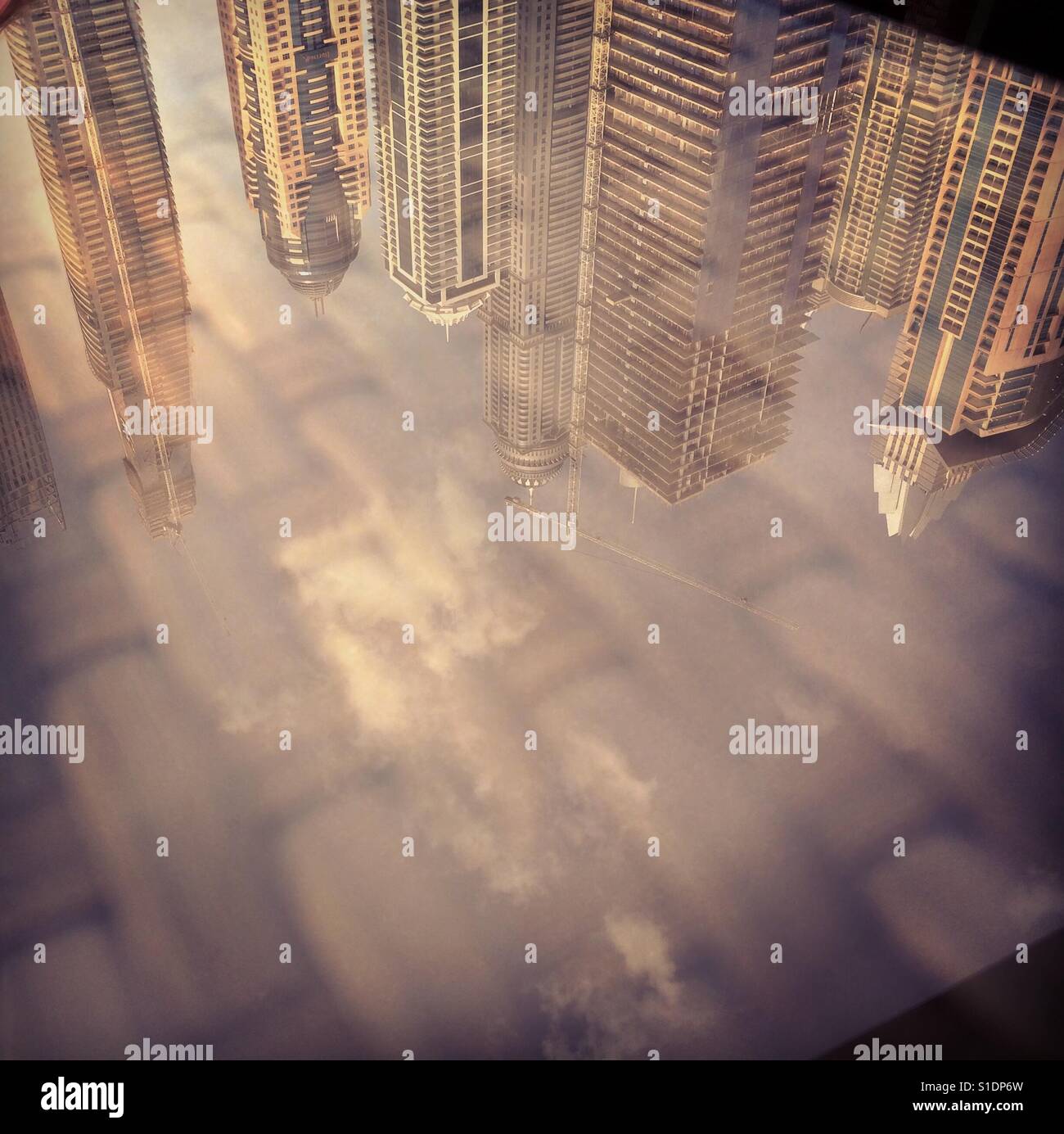 Reflection of the skyline in Abu Dhabi, United Arab Emirates - Smartphone Captured Stock Image