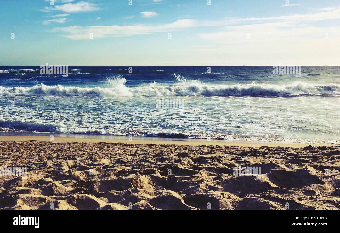 Looking out at the ocean from a sandy beach. Landscape. Room for copy. - Smartphone Captured Stock Image
