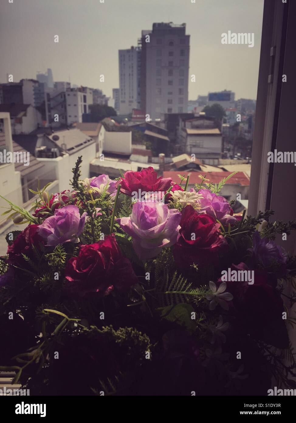 Fake flower near window Stock Photo Alamy