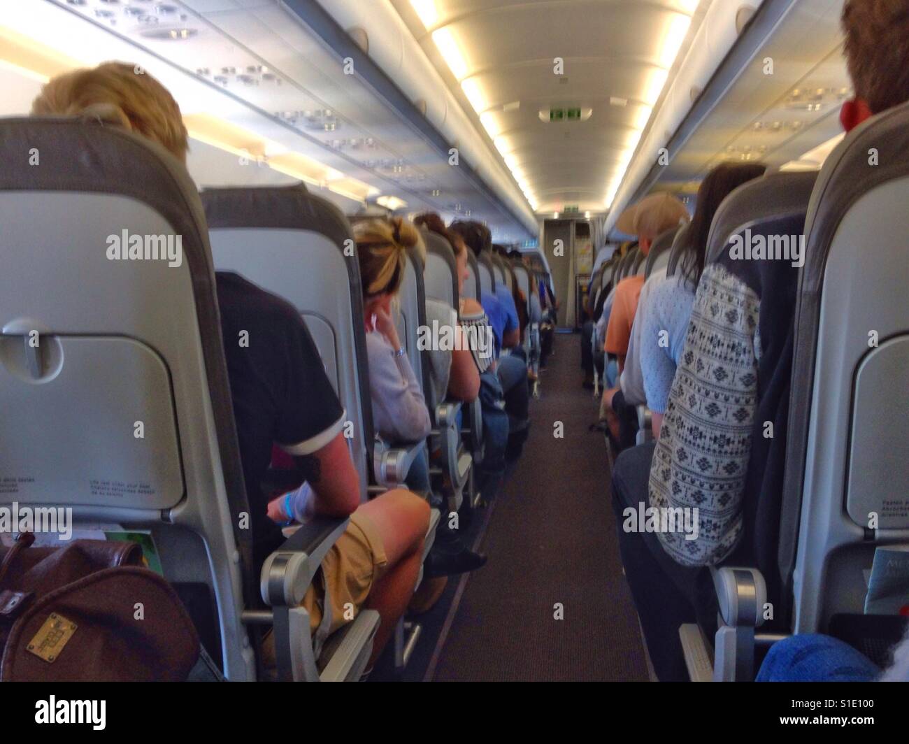 On board an Airbus A321 on a flight home after a holiday. - Smartphone Captured Stock Image