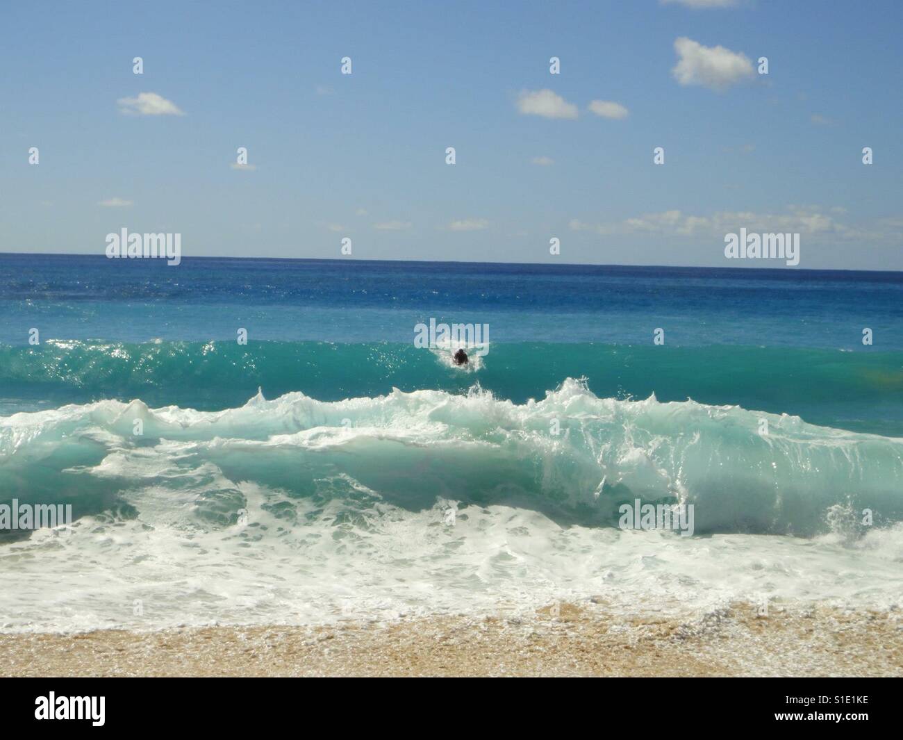 Body surfer in shorebreak - Smartphone Captured Stock Image