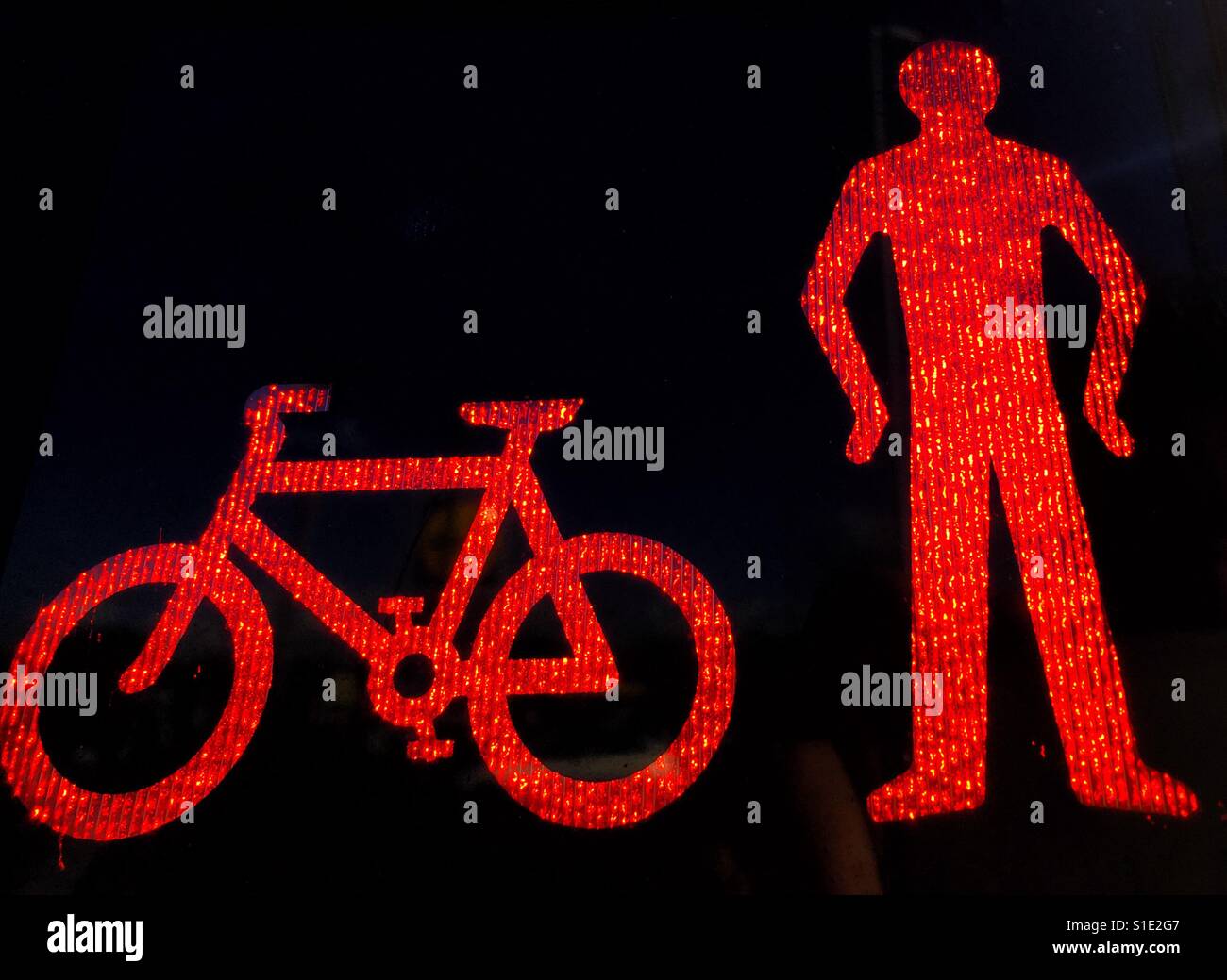 Pedestrian crossing. Traffic light on red indicating it is not safe for people or bicycle to cross the road - Smartphone Captured Stock Image