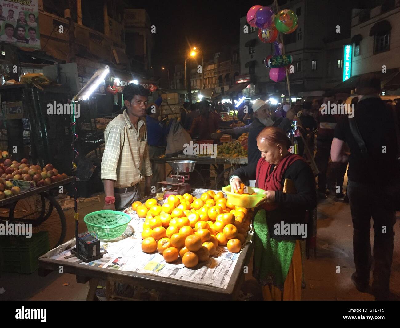 Market trader in the evening in Paharganj, India - Smartphone Captured Stock Image