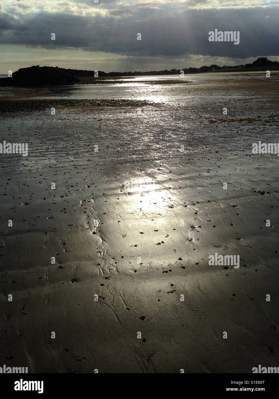 Sunlight on Elmer Sands beach, Sussex, England - Smartphone Captured Stock Image