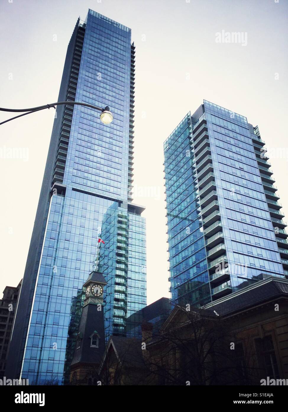 Cityscape contrasting modern and old architecture. - Smartphone Captured Stock Image