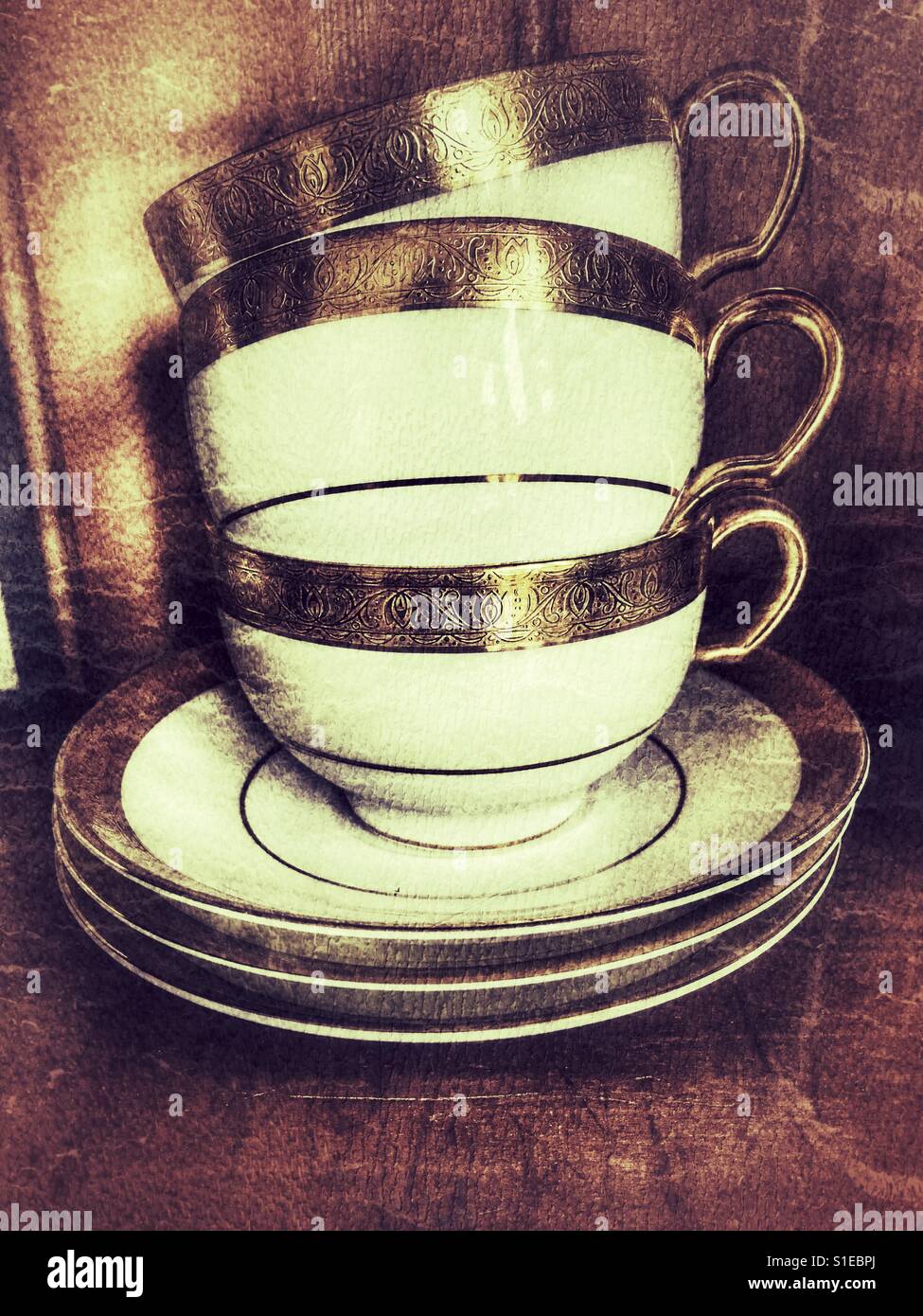 Antique cups and saucers Stock Photo Alamy