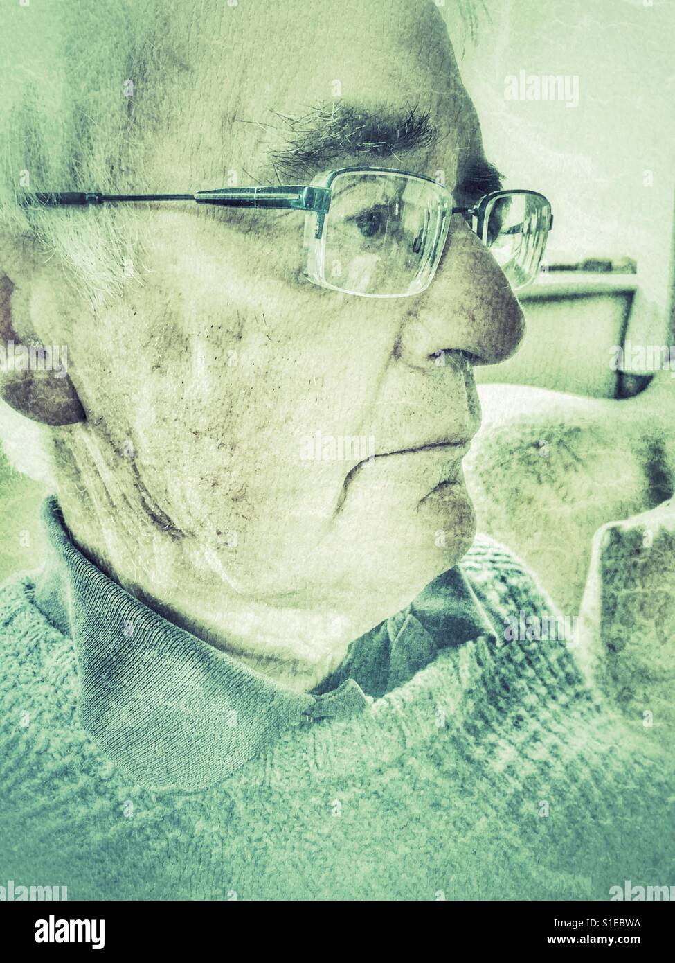 Senior man, H&S portrait indoors - Smartphone Captured Stock Image