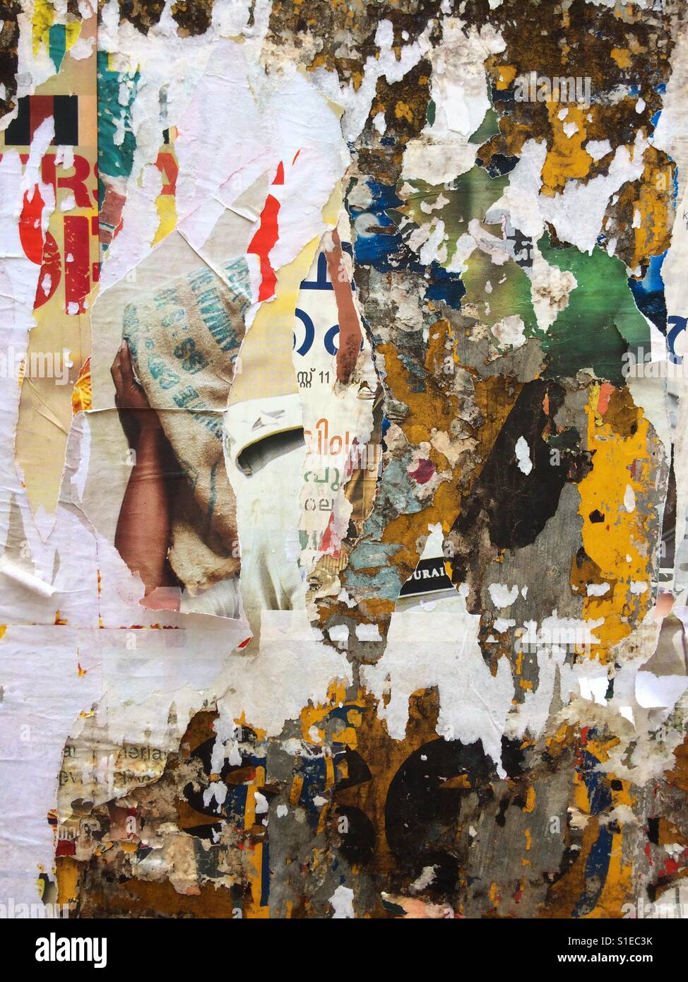 Abstract wall with peeled off posters Stock Photo Alamy