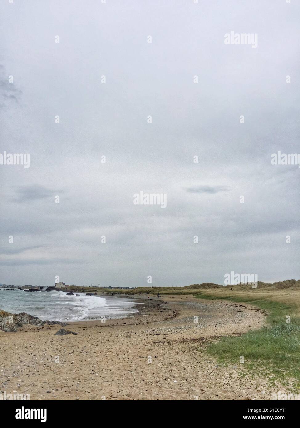 Coastline of Anglesey looking along a beach towards Rhosneigr - Smartphone Captured Stock Image