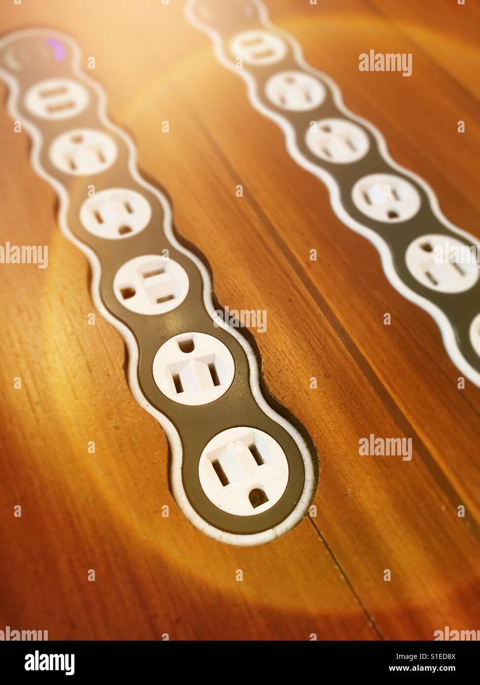 Charging station with linear array of plugs, USA. - Smartphone Captured Stock Image